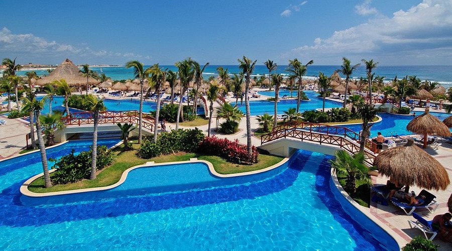Bahia Principe Luxury Akumal all-inclusive resort with tropical pools, lush gardens, and beachfront setting in Akumal, Riviera Maya.