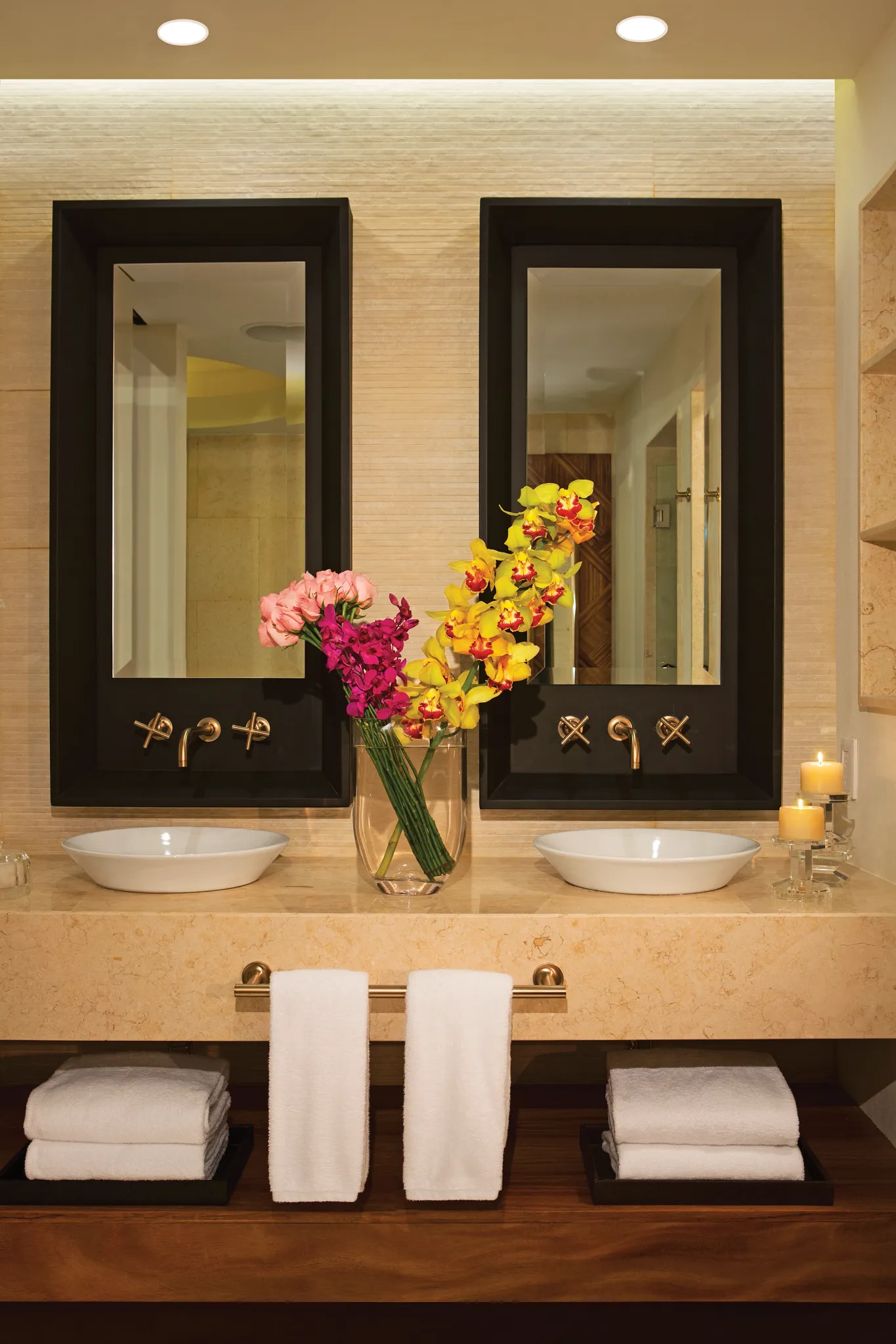 Junior Suite double sink vanity with mirrors and luxury amenities at Secrets Akumal Riviera Maya.