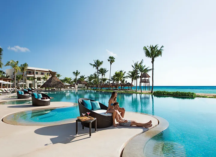 secrets-akumal-infinity-pool-ocean-view-lounging