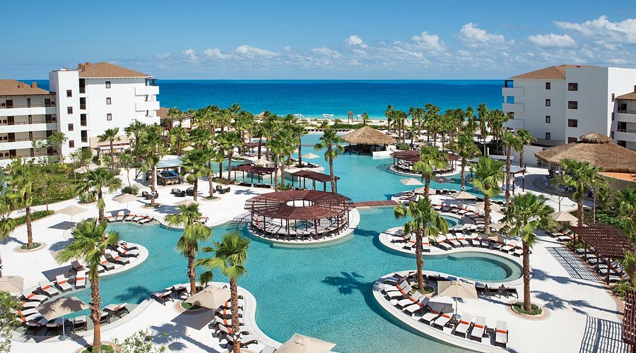 Secrets Playa Mujeres Golf & Spa Resort adults-only all-inclusive with oceanfront pools, championship golf, and luxury spa near Cancun.