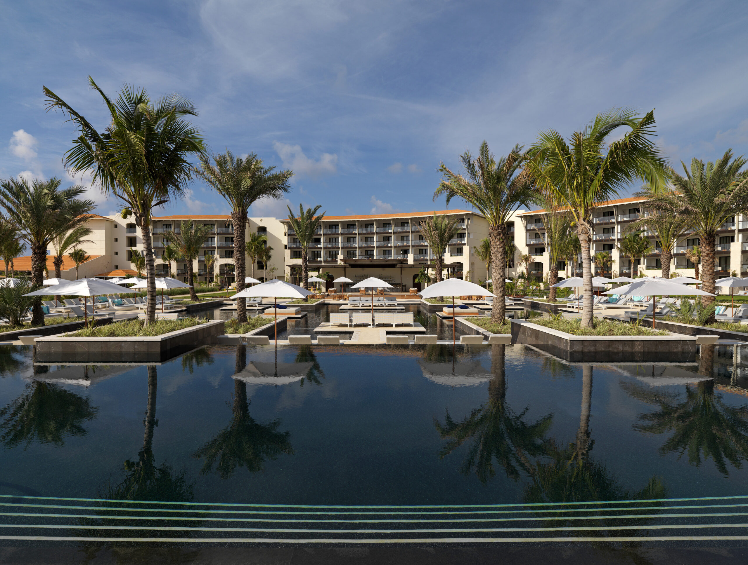 UNICO 20°87° Hotel Riviera Maya luxury adults-only all-inclusive resort with modern design, beachfront pools, and immersive Mexican cultural experiences.